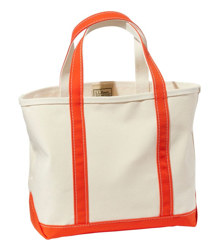 Canvas tote bag with orange accents on a white background