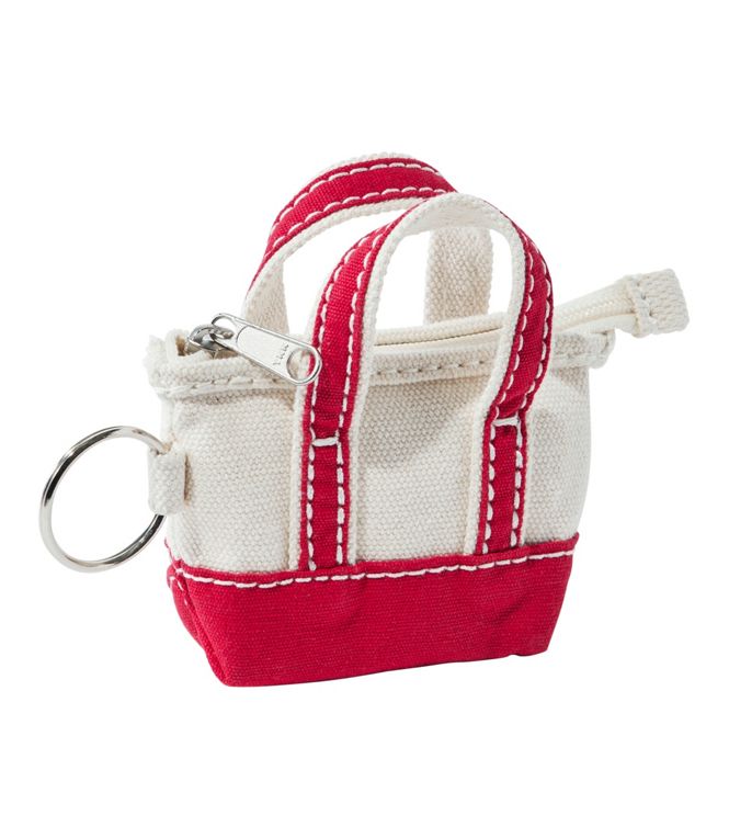 Small red and white bag keychain on a white background