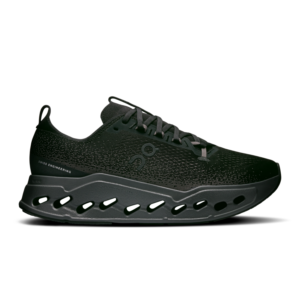 Black sneaker with unique sole design on a white background