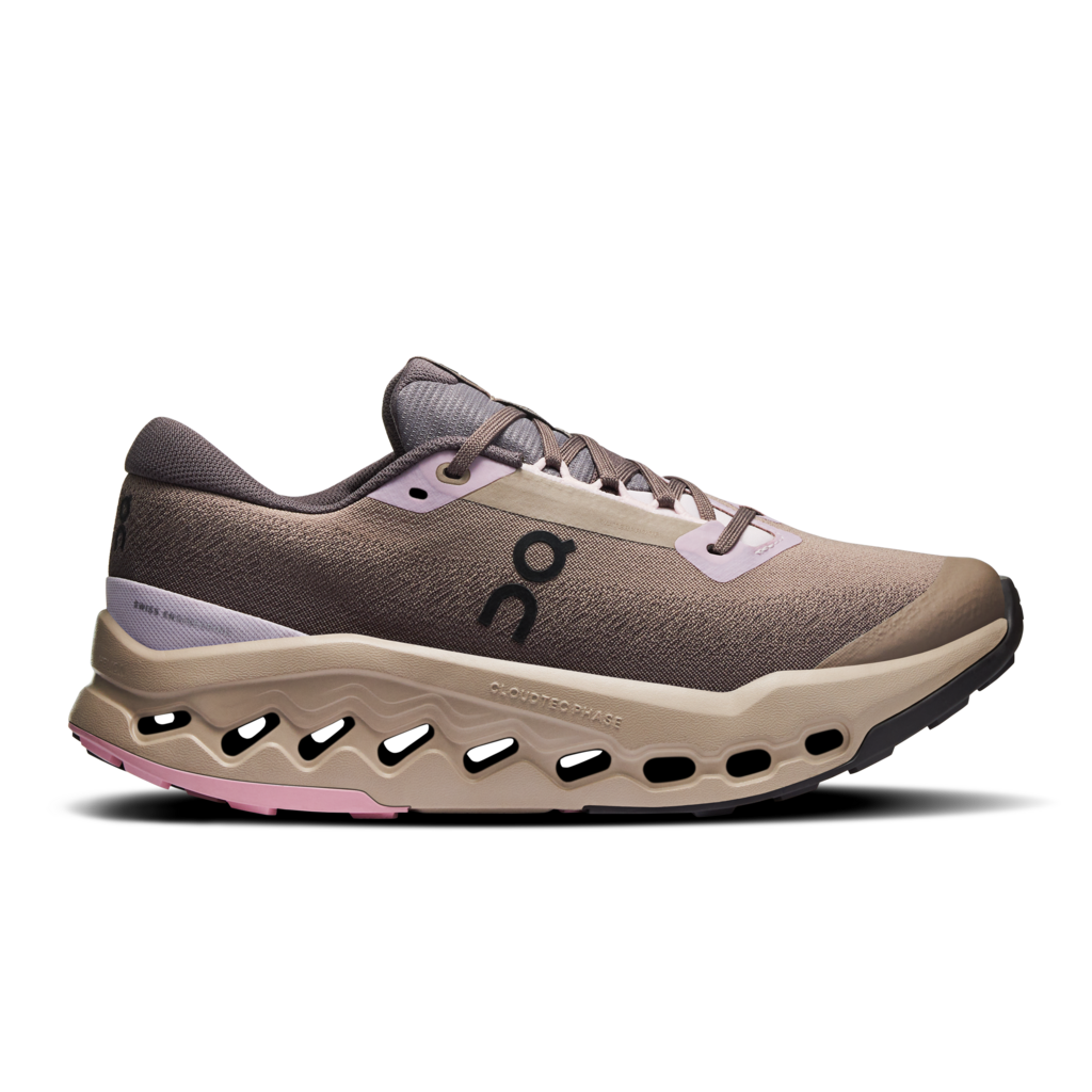 Beige running shoe with a visible brand logo on a white background