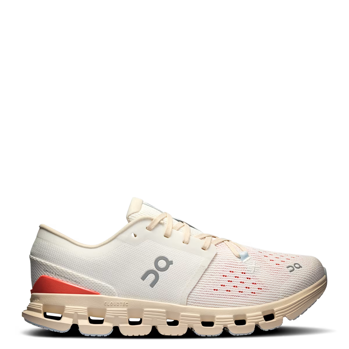 A pair of women's running shoes with a white mesh upper and a beige rubber outsole, featuring the On Running brand logo.