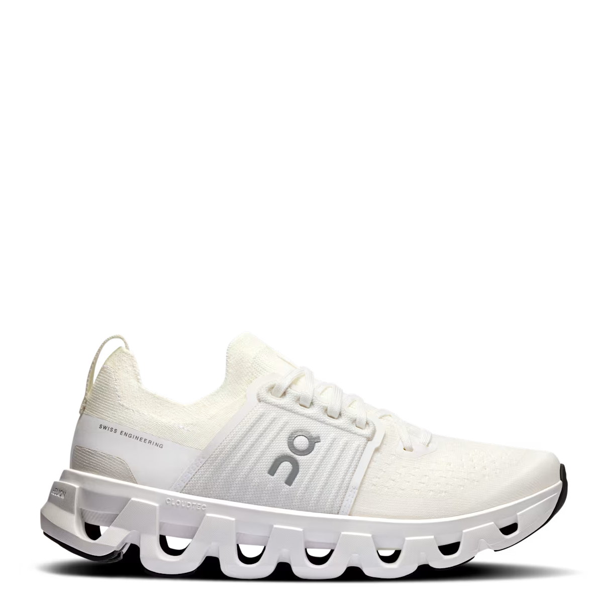 A white women's running shoe with a distinctive design, featuring a breathable upper and a thick sole with cushioning.
