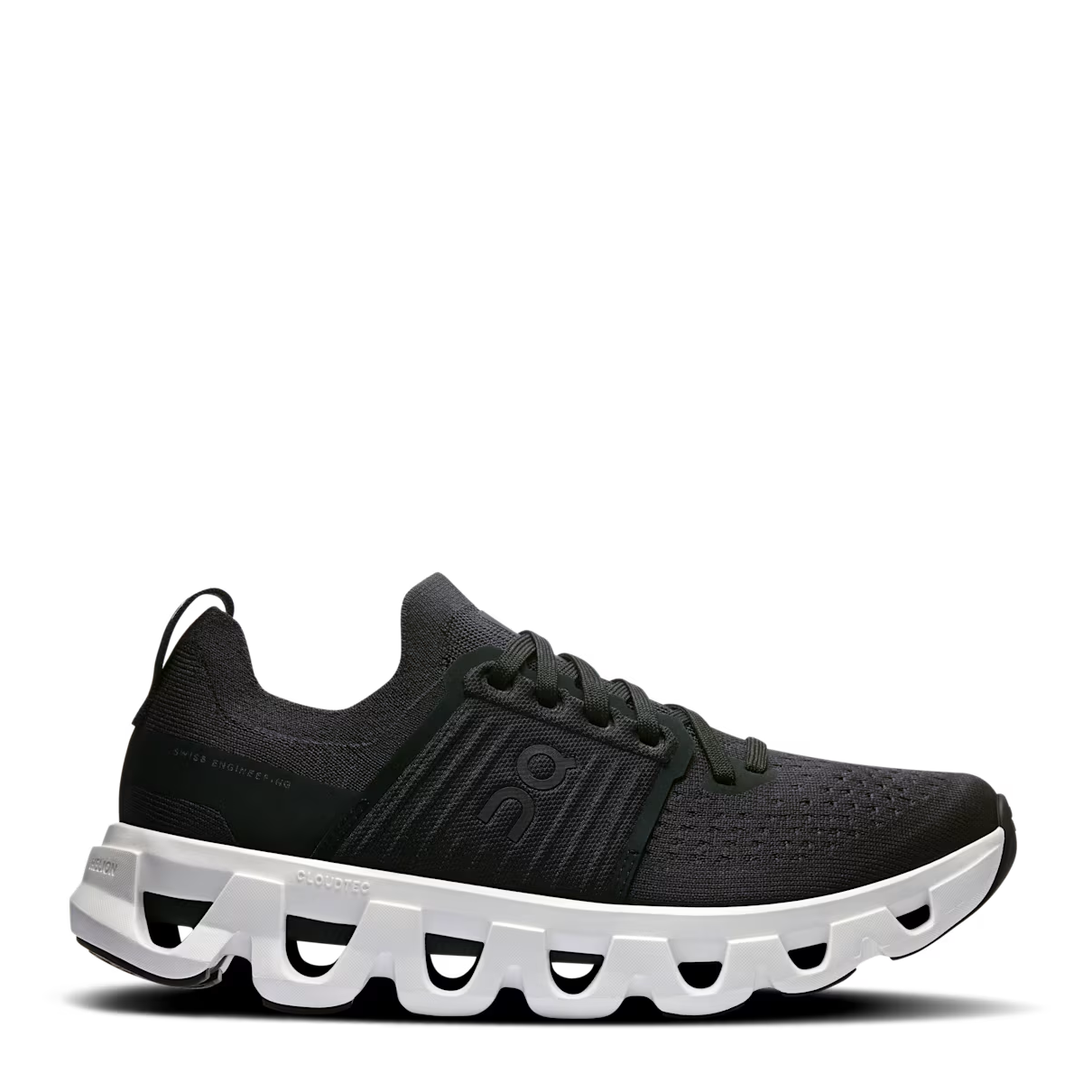 A black women's running shoe with a white sole, designed for road and city running.