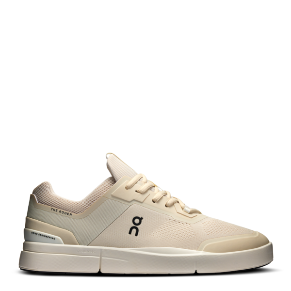 Beige sneaker with brand logo on a white background
