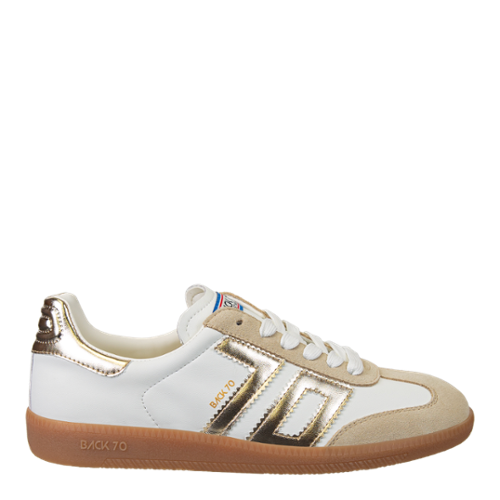 A pair of women's sneakers with a white leather upper, gold accents, and a lace-up closure.