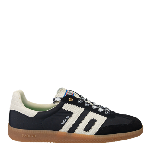 Black sneaker with white accents on a white background