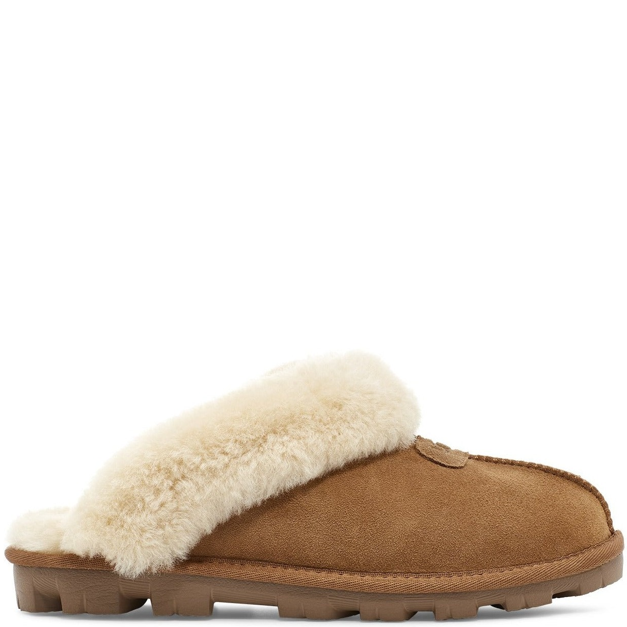 A women's brown UGG slipper with a sheepskin lining and a light brown sole.