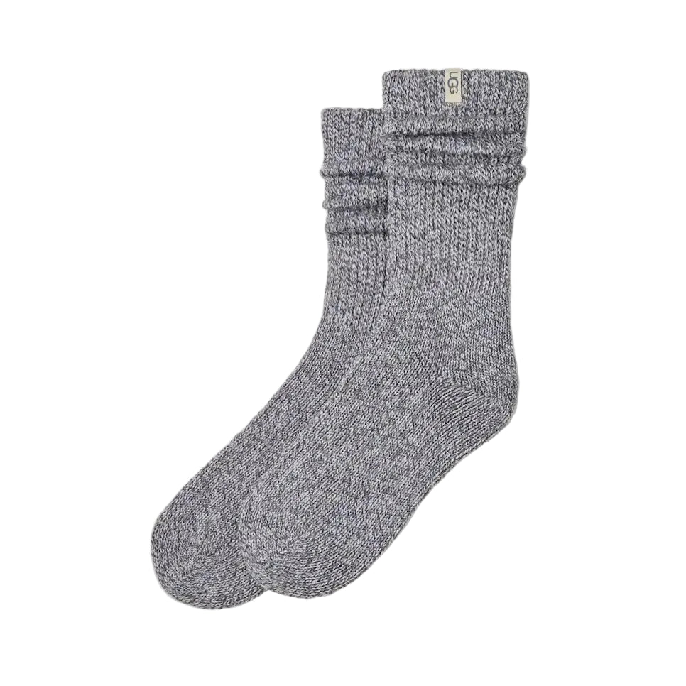 A pair of heather gray ribbed crew socks with a small beige brand tag on the cuff, displayed against a solid white background.