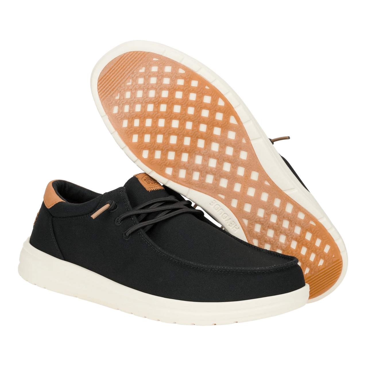 Black shoe with a brown sole on a transparent background