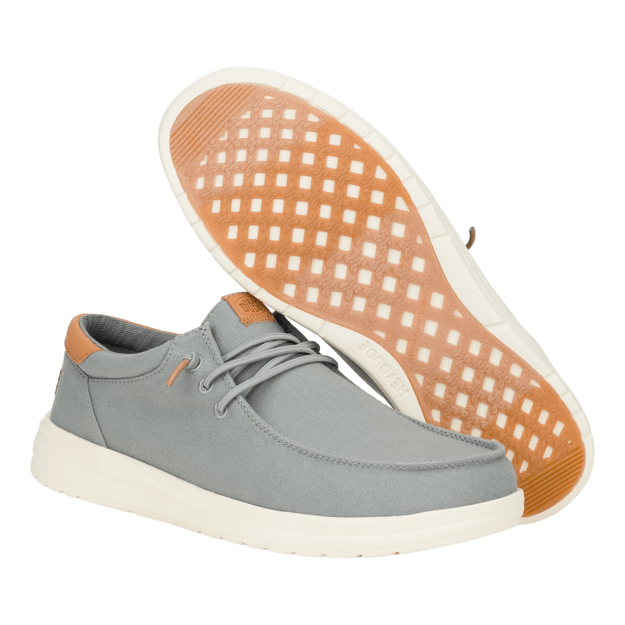 Gray shoe with brown accents on a transparent background