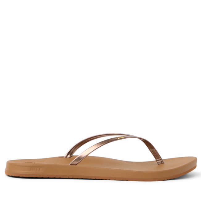 Tan sandal with a thin strap on a white background