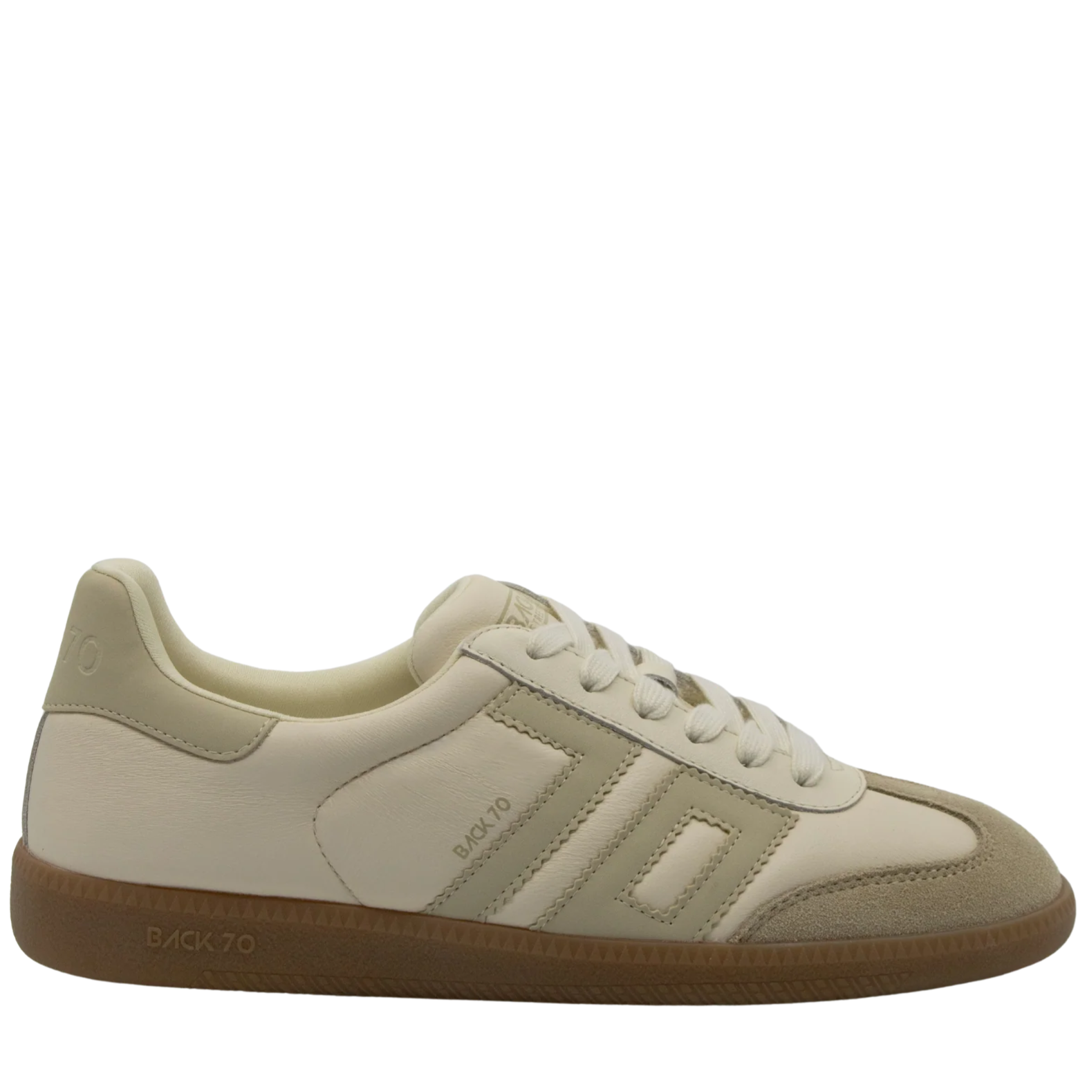 Beige sneaker with brown sole on a white background