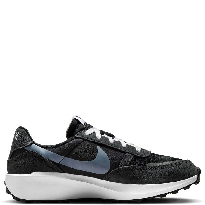 Black sneaker with a prominent Nike logo on a white background