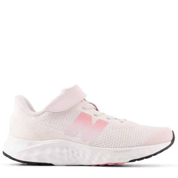 Pink athletic shoe on a white background
