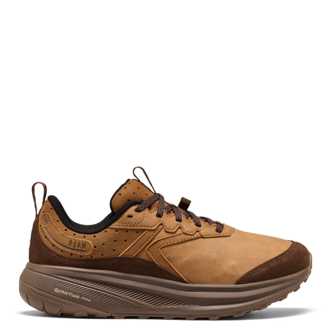 A brown and tan low-top sneaker with dark brown laces, a black collar lining, and a thick brown sole, shown from a side profile on a white background.