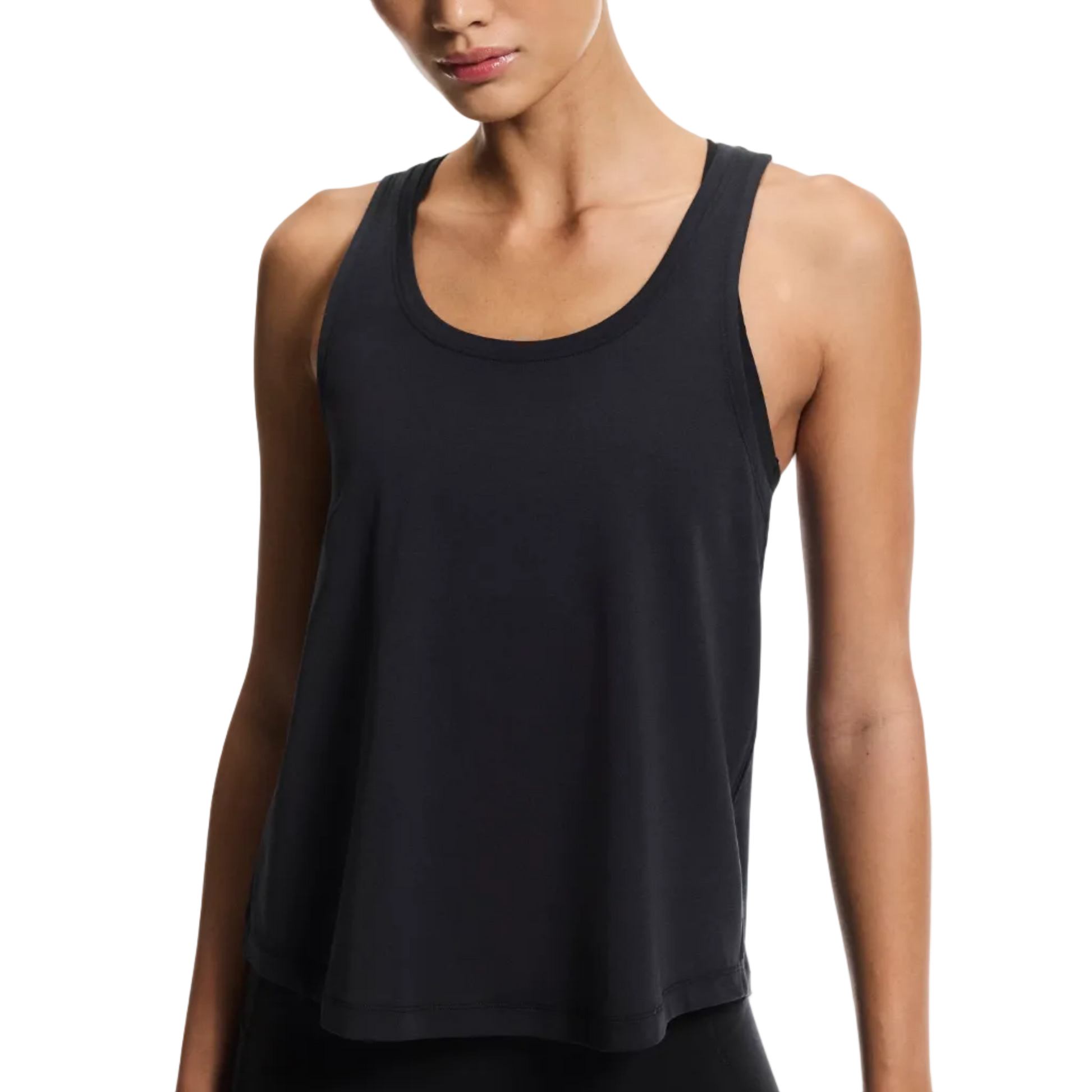 Woman wearing a black tank top against a plain background