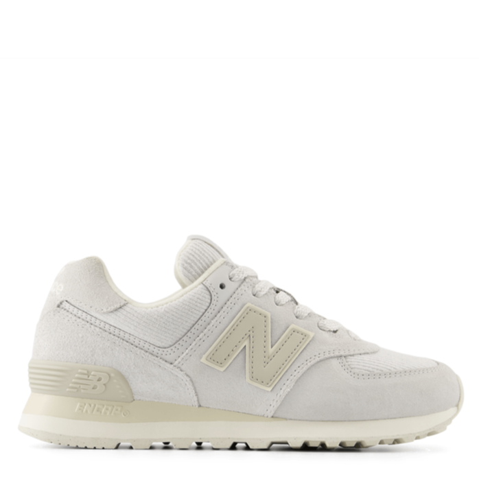 Light gray sneaker with New Balance logo on a white background