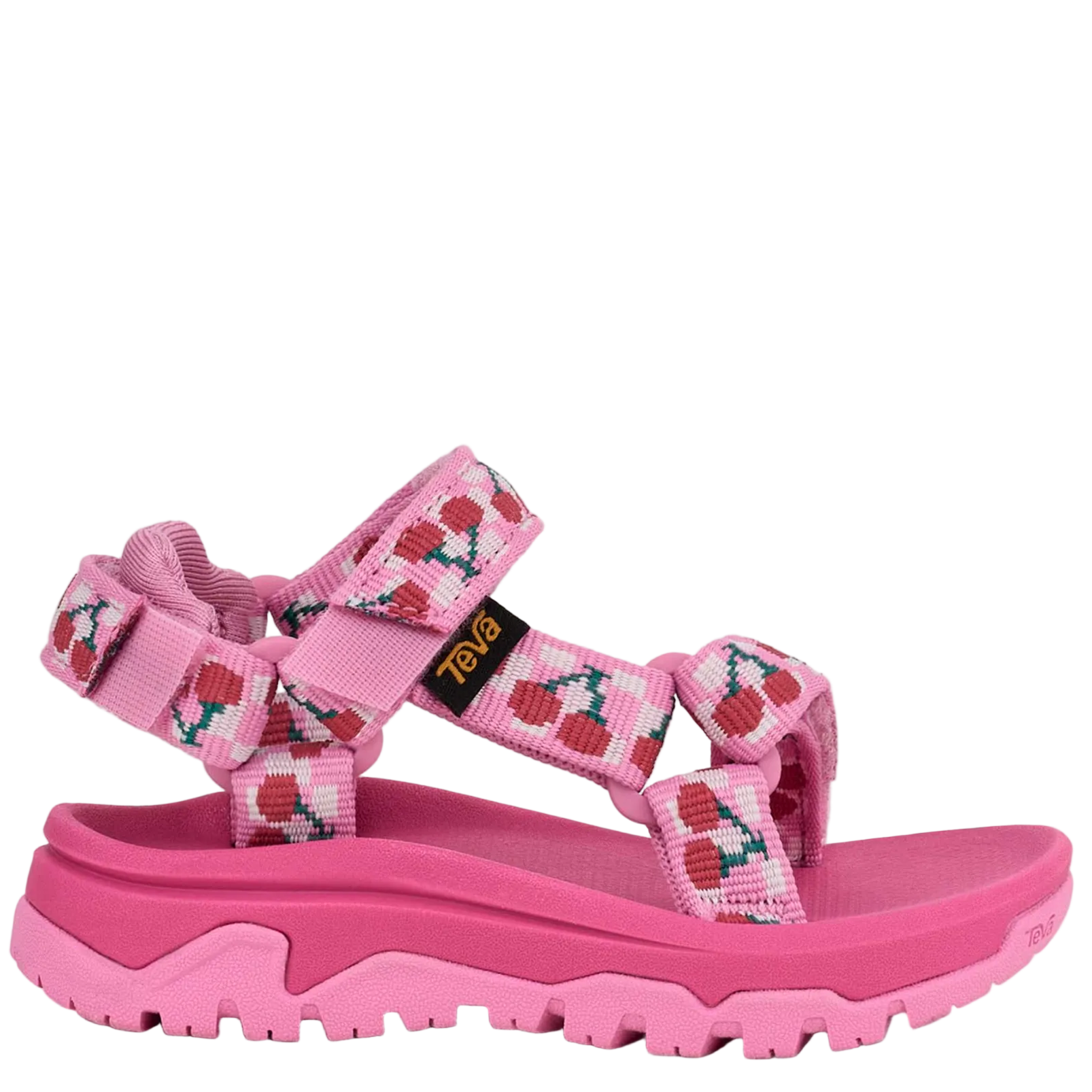 Pink sandal with cherry design on a white background