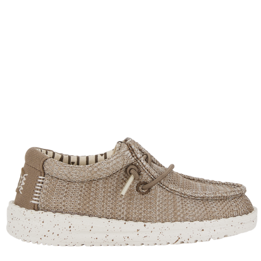 Beige casual shoe with white sole on a white background