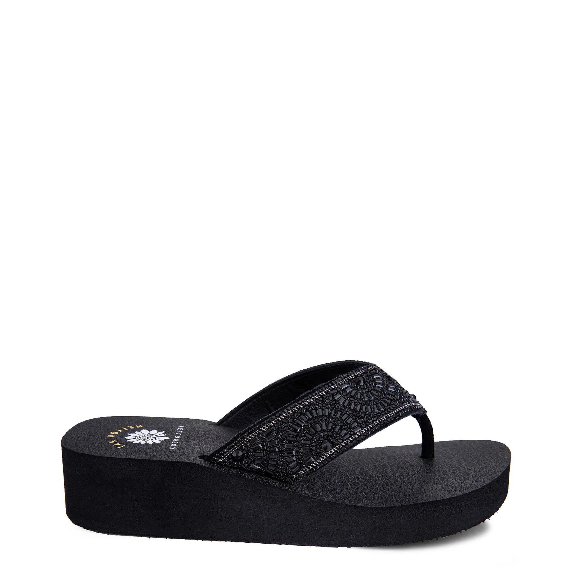 A black women's wedge sandal with a round toe and embellished straps, from the Mellow Mat collection.