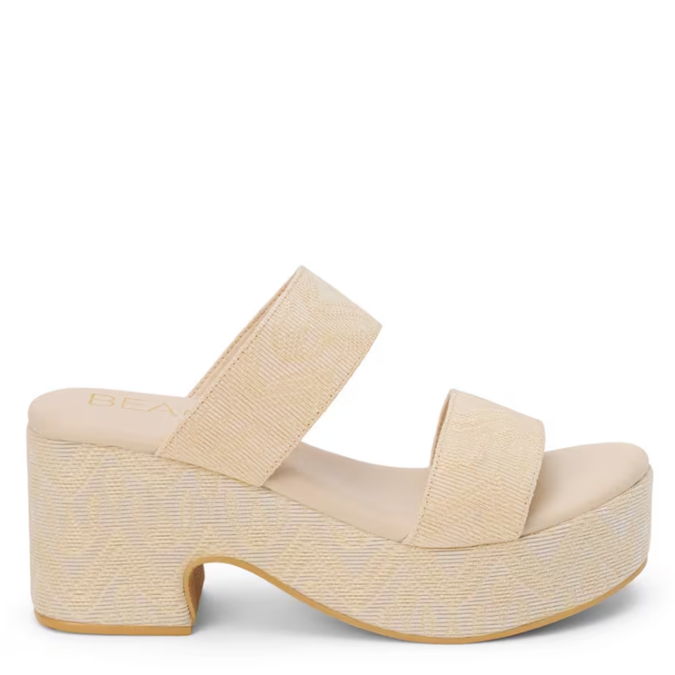Beige sandal with a platform sole on a white background