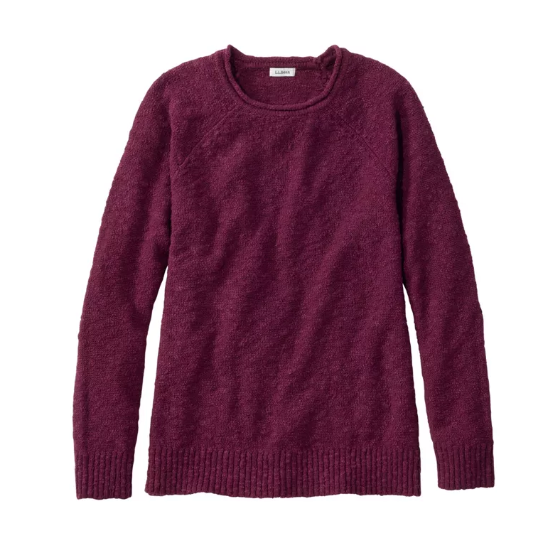 A textured, long-sleeve crewneck sweater in a deep burgundy or plum purple color, laid flat against a solid white background.