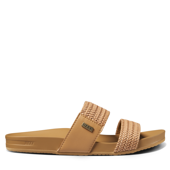 Tan sandal with woven straps on a white background