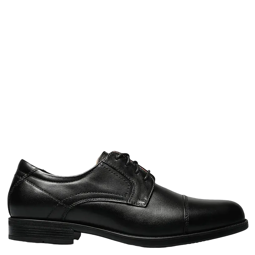 Black dress shoe on a white background