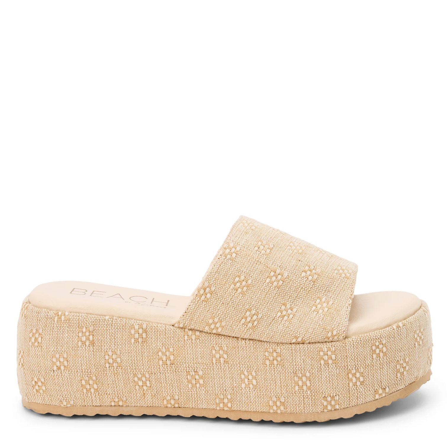 Beige platform sandal on a white background