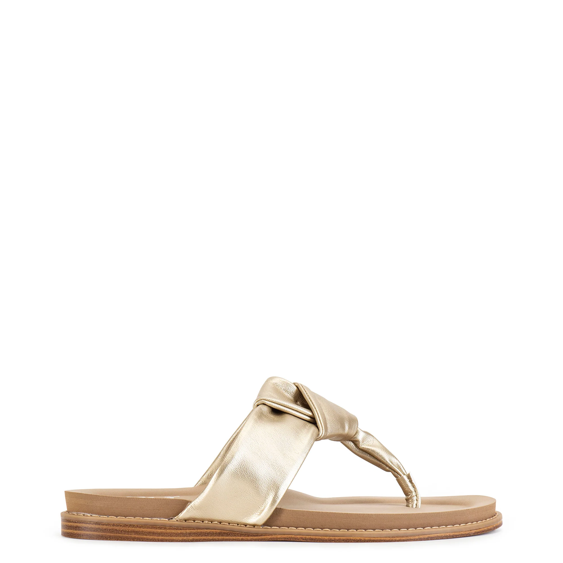 Gold sandal with a bow on a white background