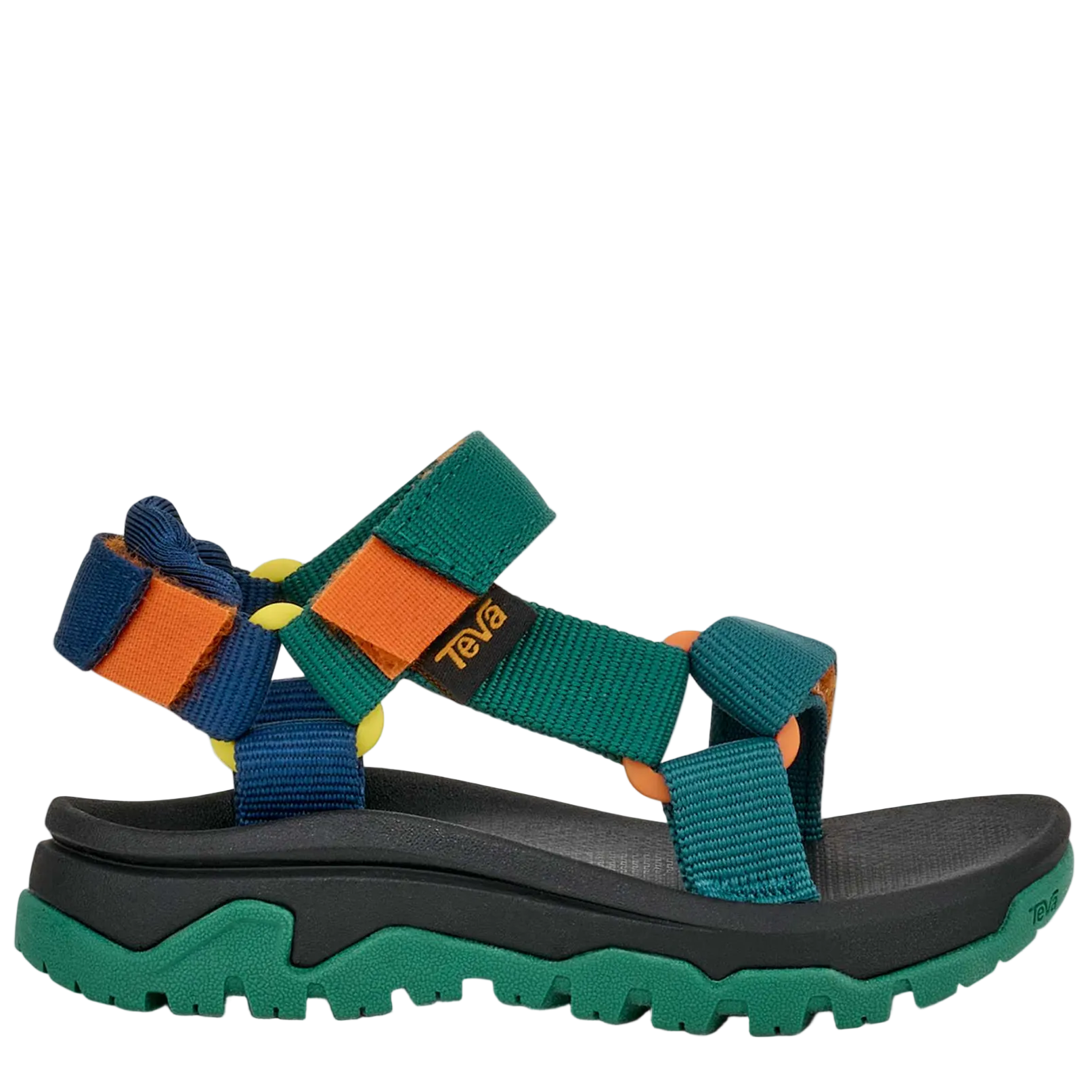 Green and blue sandal with orange accents on a white background