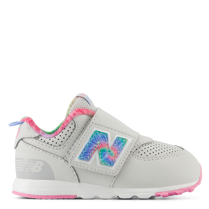 Gray sneaker with pink and blue accents on a white background