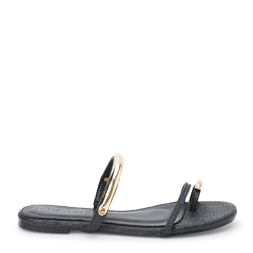 Black sandal with gold accents on a white background