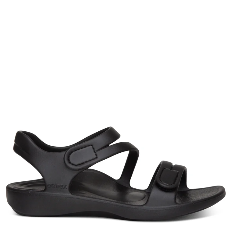 Black sandal with multiple straps on a white background