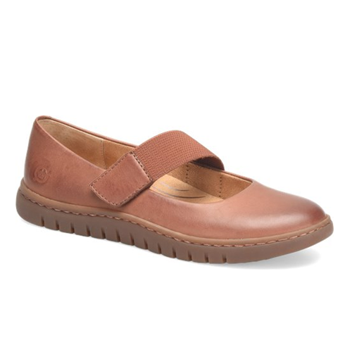 Brown shoe with a strap on a white background