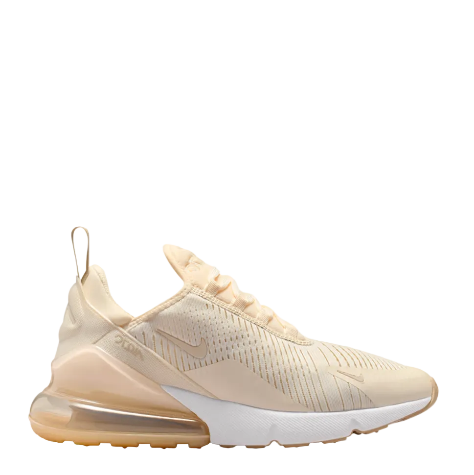 A Nike Air Max 2013 sneaker in a light beige and cream colorway, featuring a translucent amber-tinted Air Max sole and a white midsole, shown from a side profile on a light gray background.