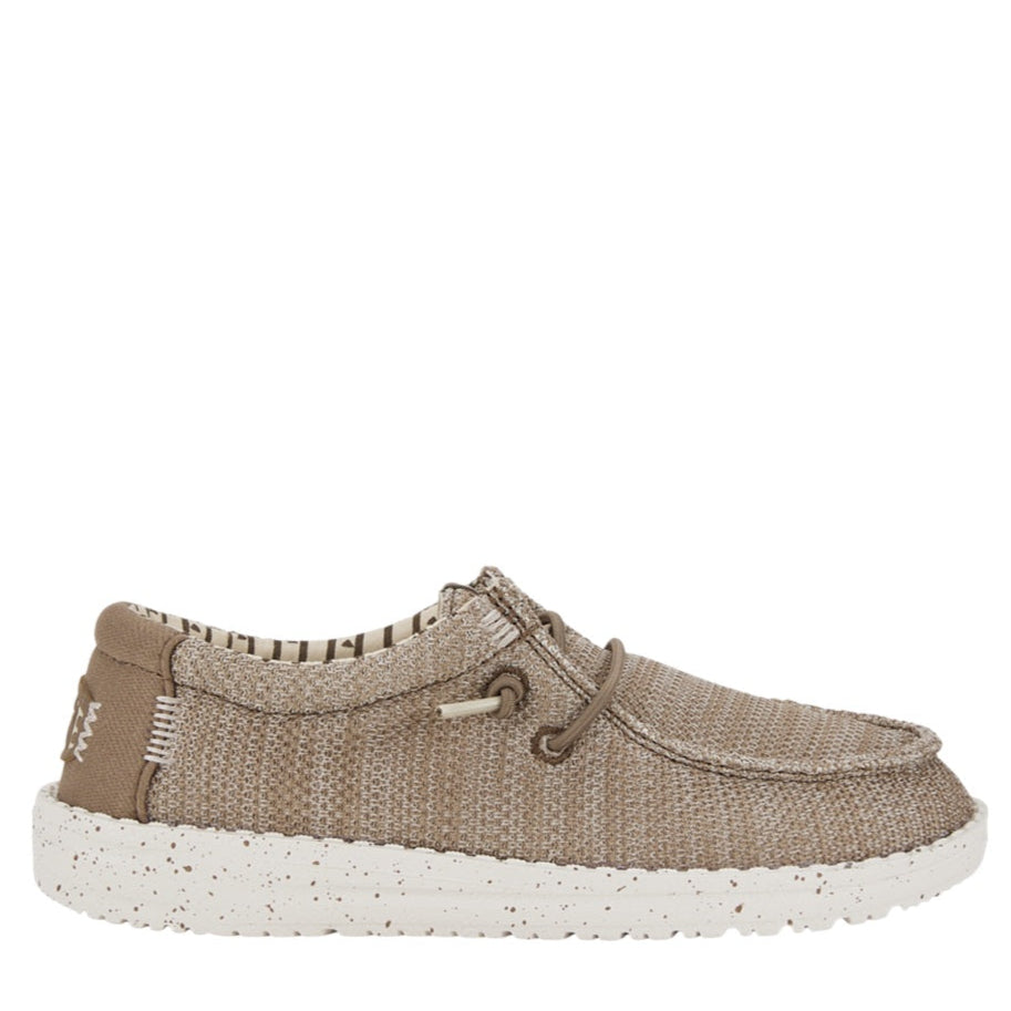 Single brown shoe with white sole on a white background